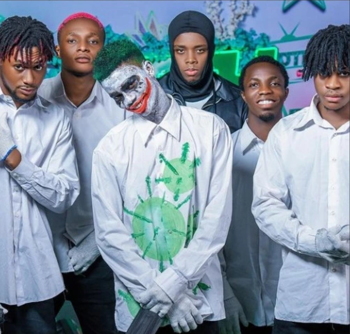 Brothers in Arm in white shirts with a painted character lead at De9jaSpirit Talent Hunt Season 2.