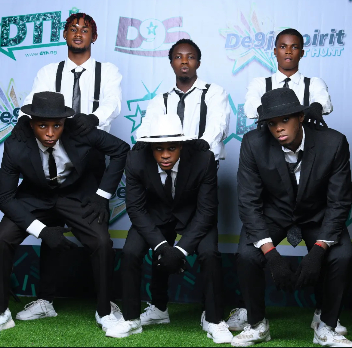 Brothers in Arm in black suits and hats at De9jaSpirit Talent Hunt Season 2.
