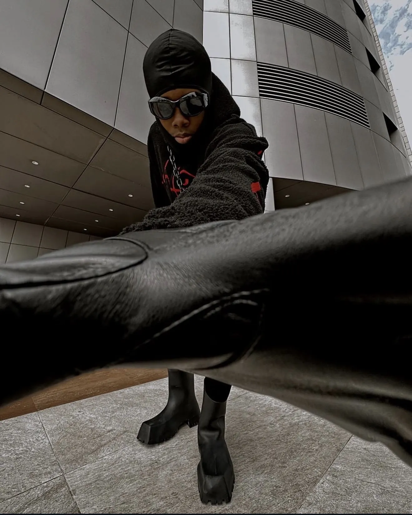 Chibundu Victor Chisom (Vickdance), hand reaching toward the camera.